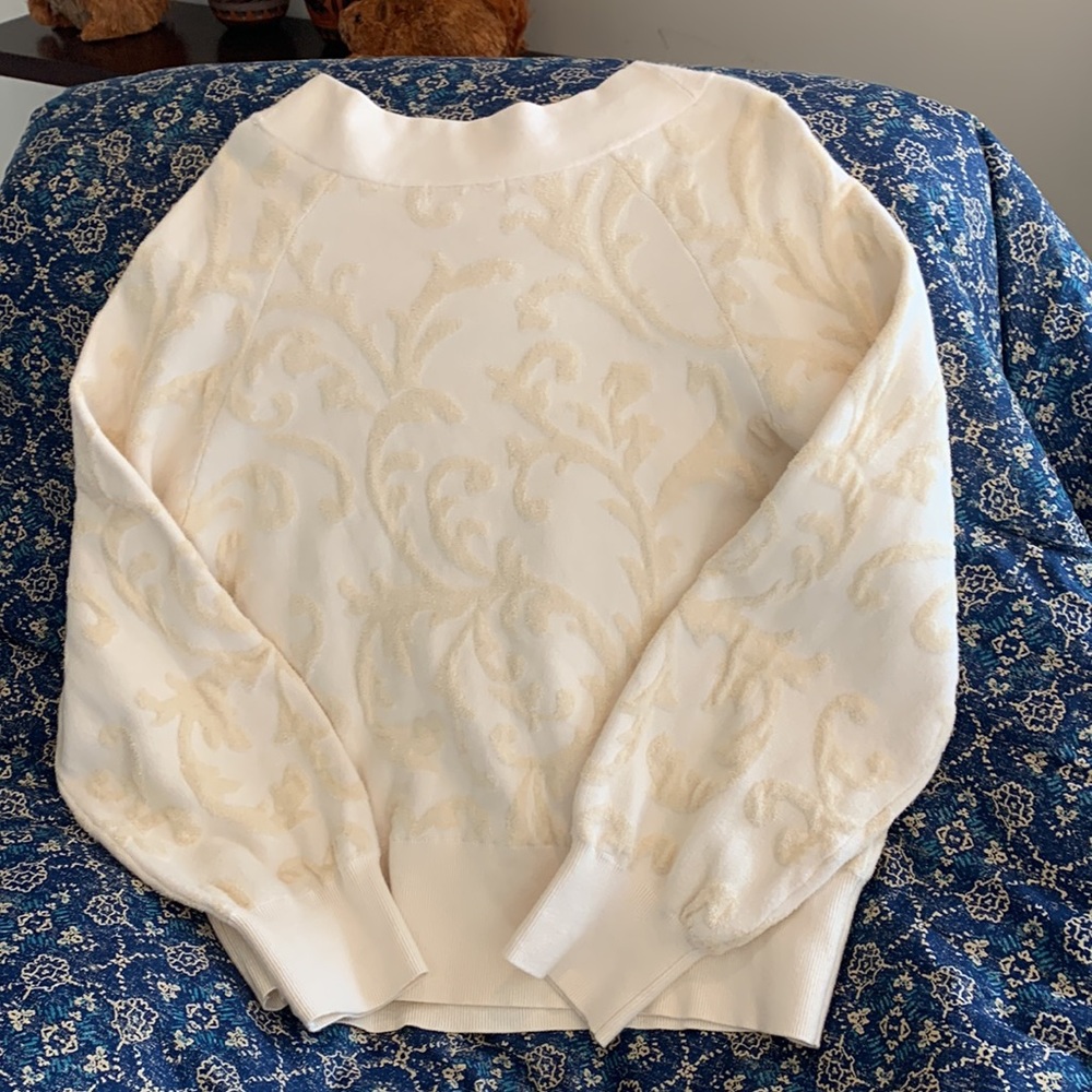Anthropologie cream heavier weight sweatshirt with self raised swirling print